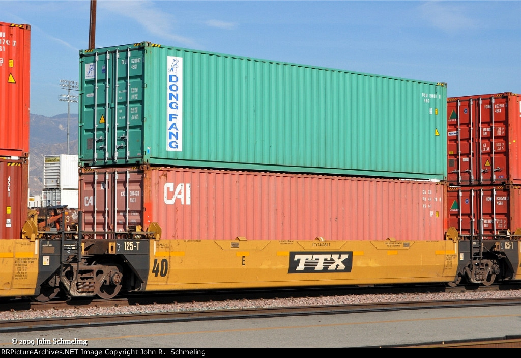 DTTX 744088-E with Dong Fang & CAI containers at San Bernardino CA.  11/30/2009